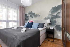 Cozy bedroom in the apartment.