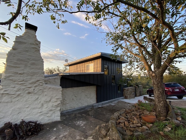 Native rock tiers create the outside and inside spaces of La Cueva.