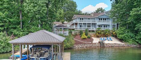 Enjoy the covered dock, private beach and amazing views from the gazebo and deck