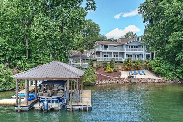 Enjoy the covered dock, private beach and amazing views from the gazebo and deck