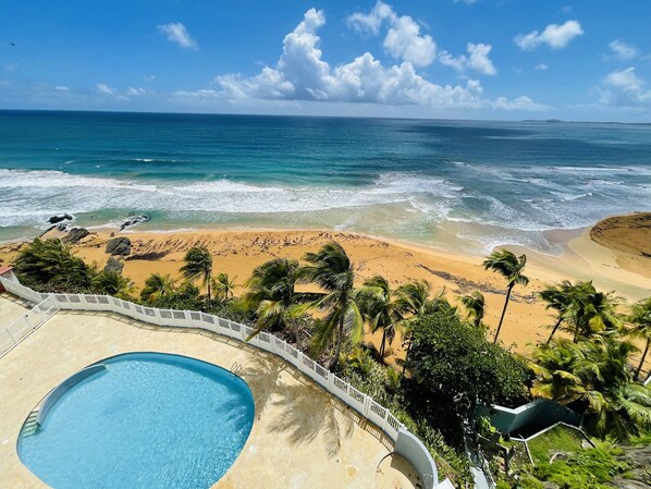 Breathtaking ocean & pool views from living area and private balcony