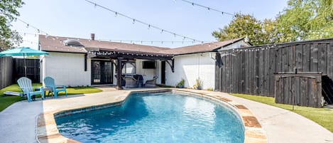 Swimming Pool with Chairs