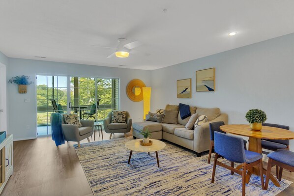 Spacious well-lit living room with modern decor!