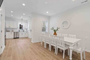 The kitchen seamlessly blends in with the living room and dining room area.