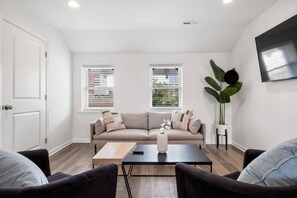 Living area with 55” Smart TV to log-in to your favorite steaming service.