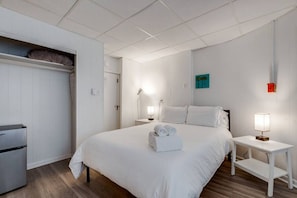 Stay organized and comfortable - our queen size bedroom with a built-in closet and dual nightstands offers the perfect combination of convenience and comfort.