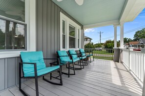 Our covered front porch has a fan and rocking chairs to view the local ospreys. 