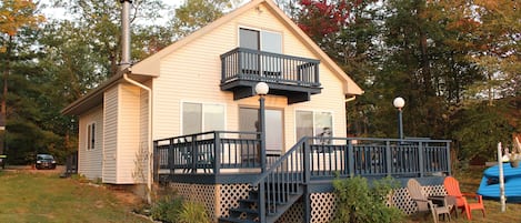 Lakefront side of the house - deck and king bedroom balcony. 