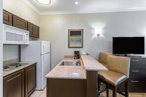 The fully-equipped kitchen features all the amenities you'd need to make a delicious meal.