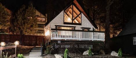 A well lit path and spacious driveway provides ease of access to the chalet.
