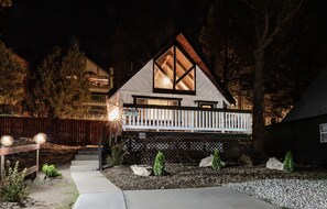 A well lit path and spacious driveway provides ease of access to the chalet.