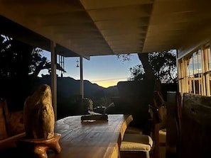 Sunset From The Outdoor Dining Table And Seating Area