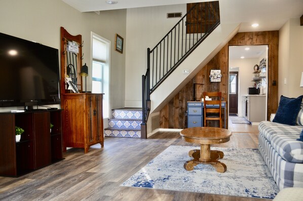 Cozy up in the living room and stream your favorite show on the big screen TV.