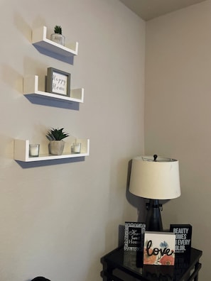 Wall art/decor of living room space.