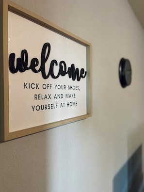 Wall art/decor of living room space.