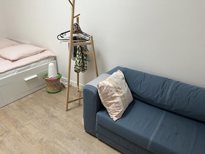 sofa and clothes hanger