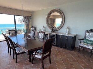 8 seater Dining Table with mini fridge for your wine and drinks.