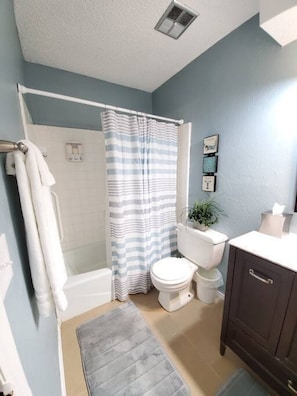 Hall bathroom to be shared with the other two bedrooms