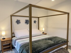 You'll not want to leave after sleeping a comfy night in the bold canopy bed