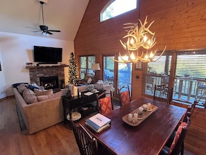 Huge family den area with Large Sectional Sofa, Gas Fireplace & Big Screen TV!