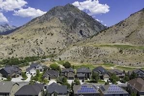 Unobstructed mountain views, directly on a golf course.