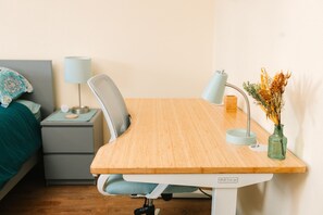 The master bedroom includes a UPLift standing desk, great for remote working.