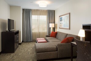 Sink into the cozy sofa after a day exploring the area.