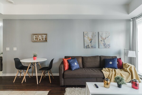 Full living room with dining table