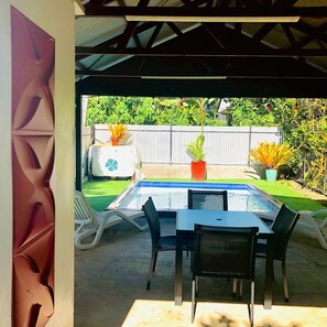 Covered pool area with toilet 