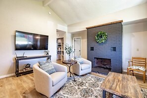 Spacious living room with seating for up to six.