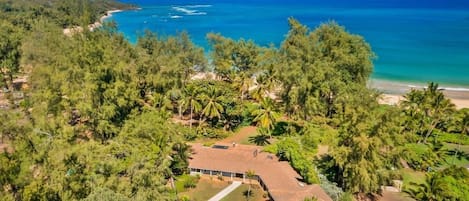 Areal view of Anahola house on beach.