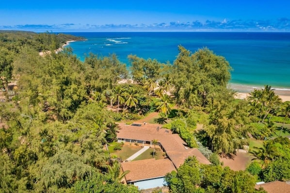 Areal view of Anahola house on beach.