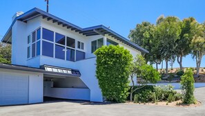 Private drive, tucked away on the bluffs above Zuma Beach.  You will love the privacy and amazing expansive view of this lovely retreat.  These large windows face west for a beautiful sunset with expansive unobstructed ocean views.