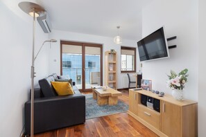 Spacious living room with full equipment.
