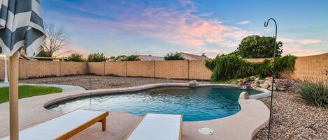 Sparkling swimming pool ready for you to take a dip after a day (or night) out