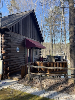 Side Deck with Gas Grill and outdoor table with chairs