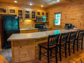 Fully stocked kitchen and coffee bar