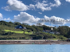 Hen Ty Llaeth is the white cottage at the front, where the arrow tip points to.