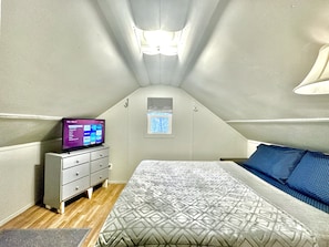 Cabin style tiny home with fire pit, outdoor seating, hammock, & full kitchen