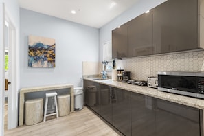 kitchen with complete amenities for hearty meals!
Note: Electric 2 burner stove only