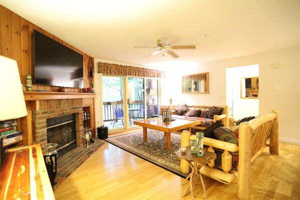 Updates living space with large flat screen tv at Deer Park Resort
