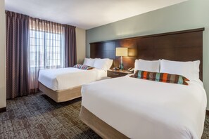 Get a good night's rest in the cozy bedroom.