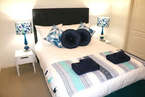 Main bedroom with Queen bed, ensuite & WIR. 