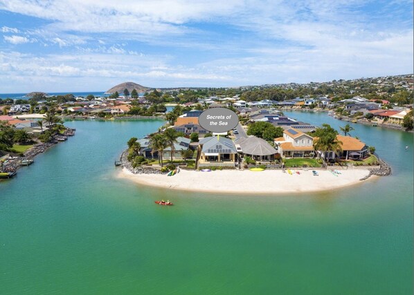 Overhead view of Secrets of the Sea with it's private beach (not open to public)