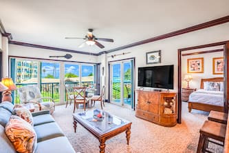 Oceanfront luxury steps from the beach with pool, hot tub, balcony & central AC
