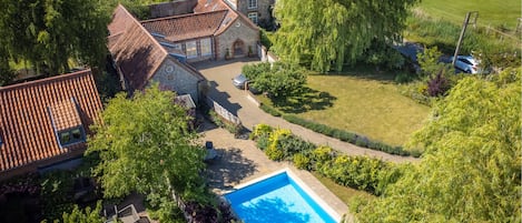 School House, Burnham Thorpe:  Aerial view of gardens and swimming pools