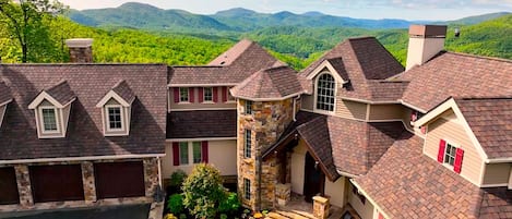 House sits on top of the mountain with unobstructed views.