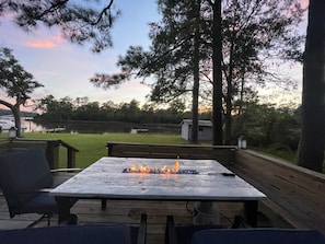 Fire table and bench seating on wraparound deck