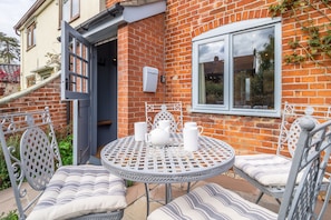 Front entrance to Tipple Cottage  with outdoor bistro table