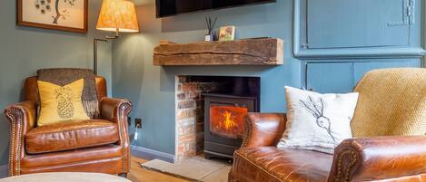 Ground floor: Sitting room with wood burning stove